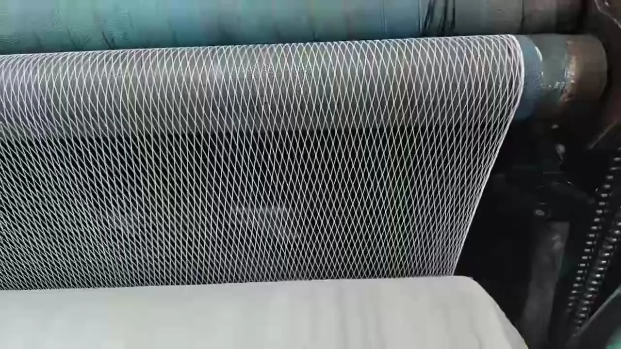 Close view of the mesh structure on a production roller