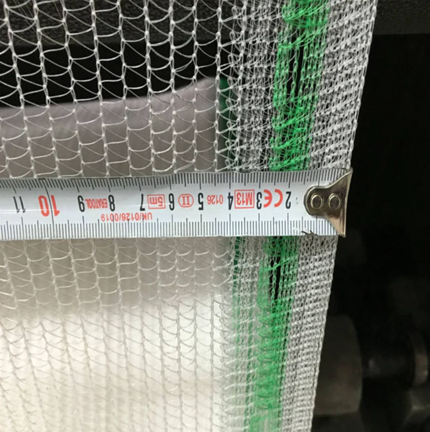 Close-up of net construction and reinforced edge with a measuring tape